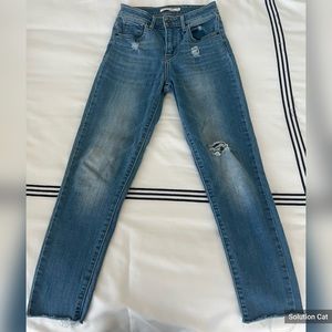 Levis Women’s 721 Skinny High Rise Jeans w/ frayed hem